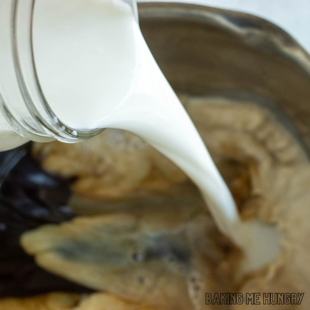 cream being added to saucepan