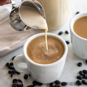 caramel coffee creamer recipe being poured into mug of coffee
