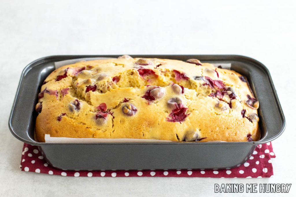 loaf pan with cranberry bread