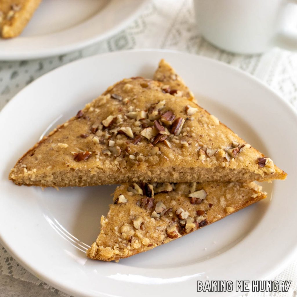 small coffee cake recipe shown cut into triangles and served on plate