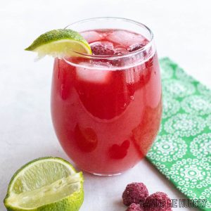 raspberry mocktail in wine glass