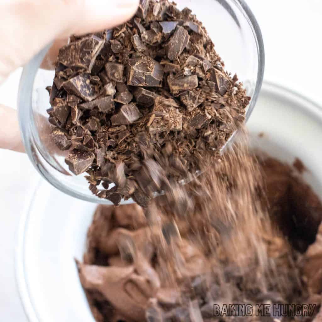 dark chocolate chunks being poured