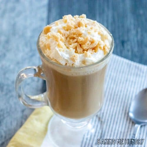 starbucks caramel brulee latte recipe topped with whipped cream and caramel crunch