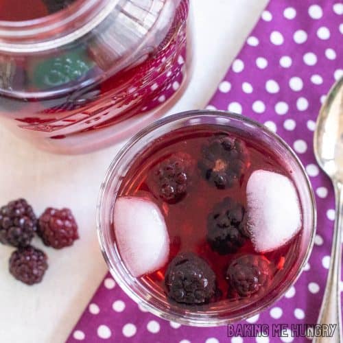 starbucks hibiscus tea recipe with blackberries in a jar and in a glass with ice