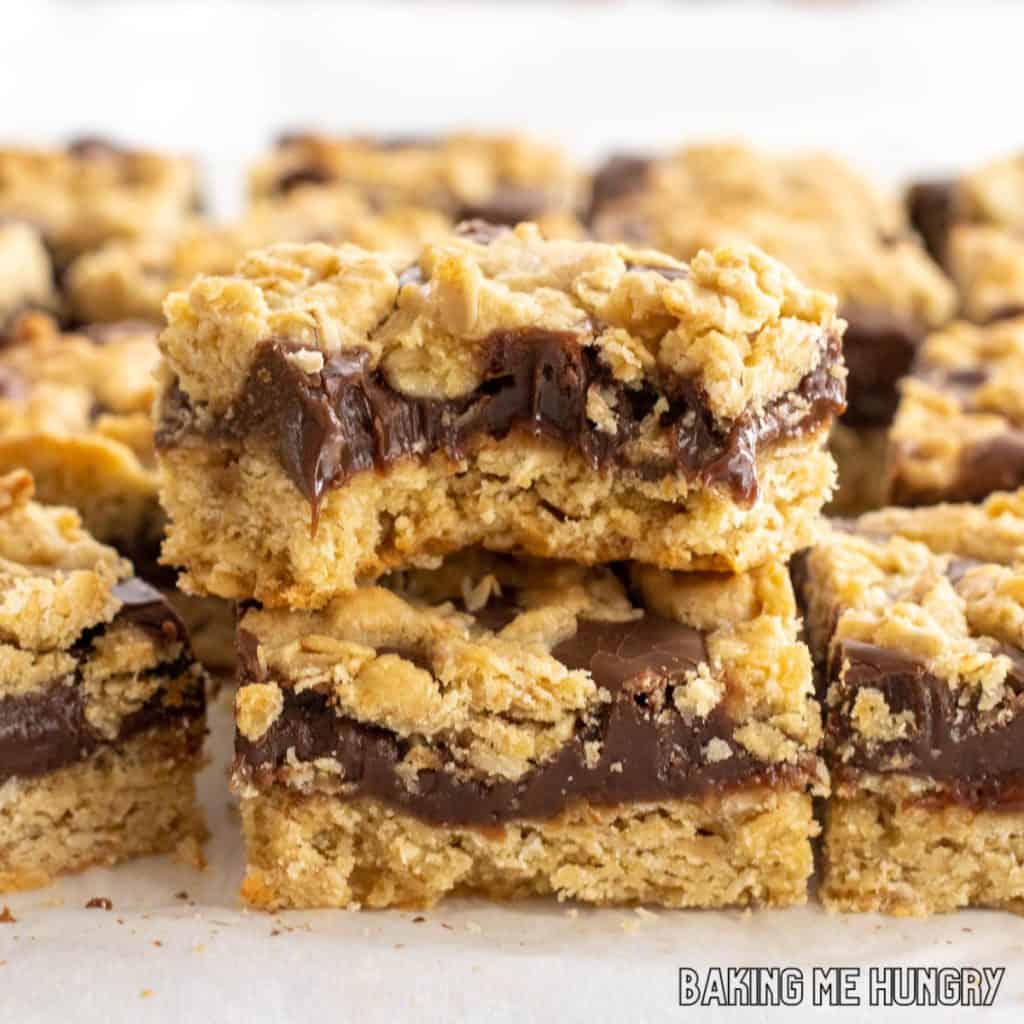 starbucks oat fudge bars recipe shown with bars stacked with the top one missing a bite