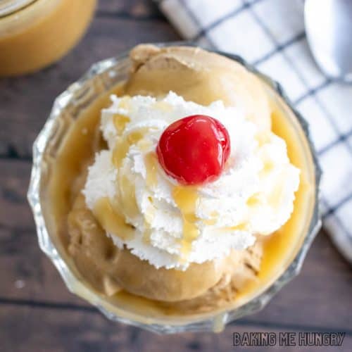 2 ingredient caramel sauce served on top of coffee ice cream with whipped cream and a cherry