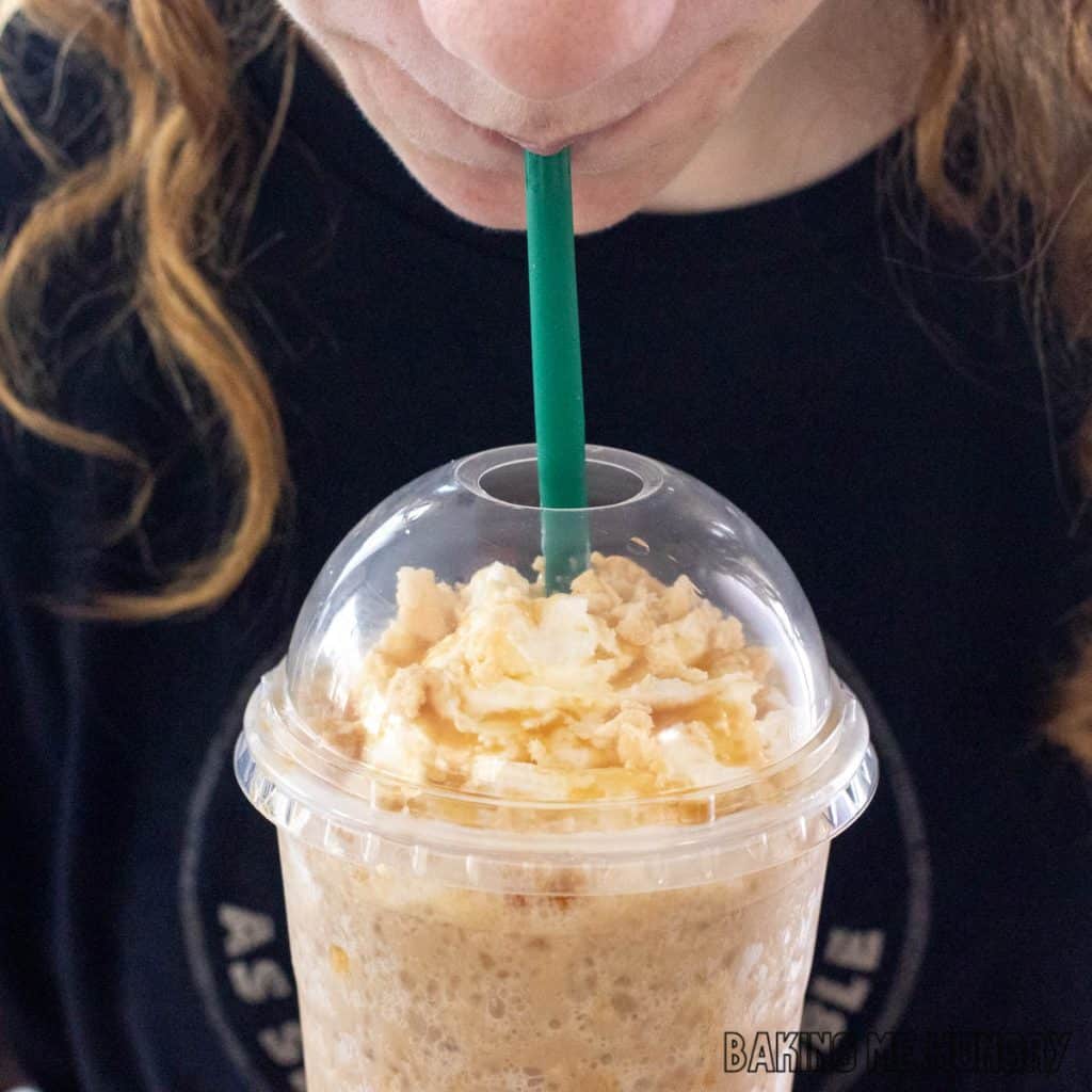 close up of a girl sipping the starbucks copycat recipe