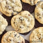 cookies and cream cookies sitting on top of oreo cookies