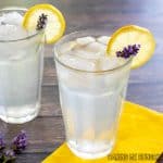 vertical shot of two glasses of lavender lemonade