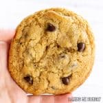 hand holding a single serve chocolate chip cookie