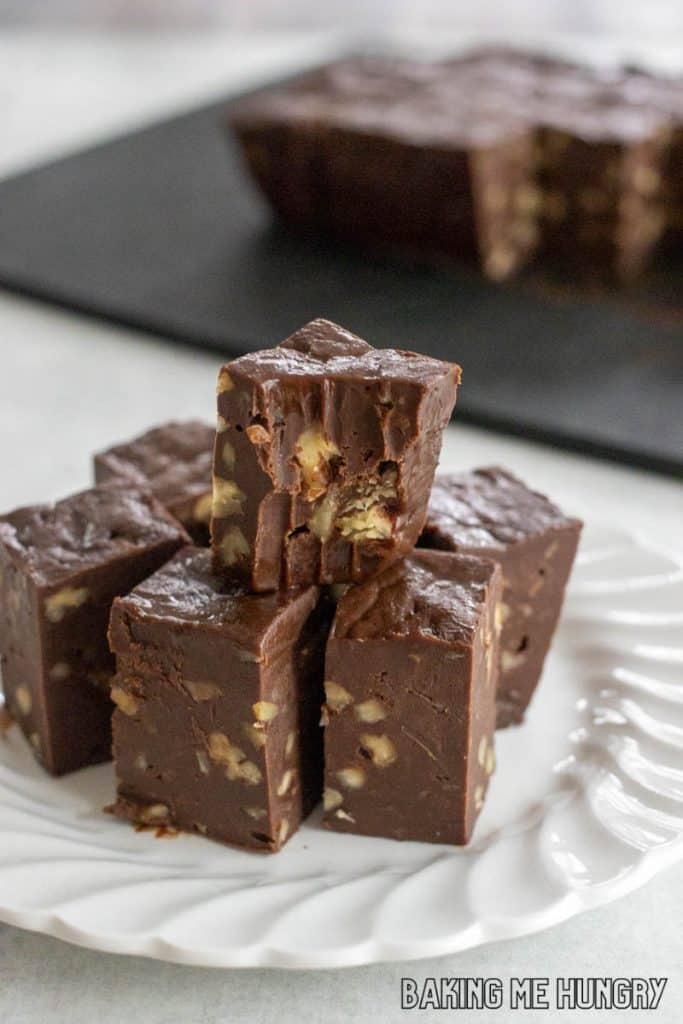 3 ingredient microwave fudge on a plate with top piece missing a bite