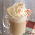peppermint white chocolate mocha recipe with whipped cream and candy cane garnish close up