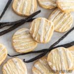 vanilla bean cookies with vanilla beans on white surface