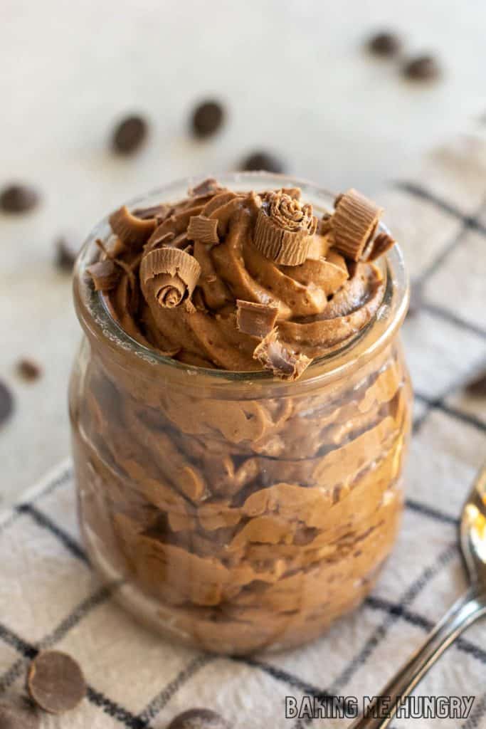 3 ingredient chocolate mousse in a small jar topped with chocolate shavings close up