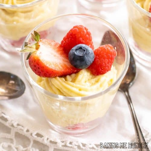 vanilla bean custard in jar with berries