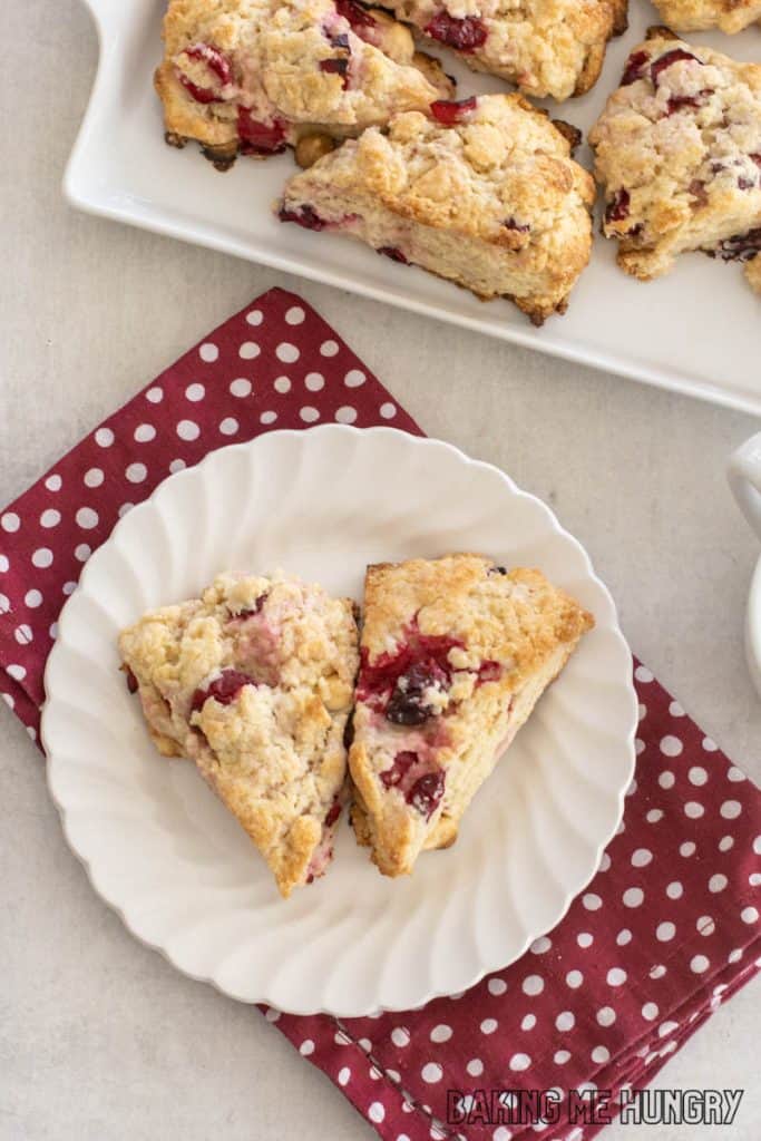 overhead shot of white chocolate cranberry scones on plate