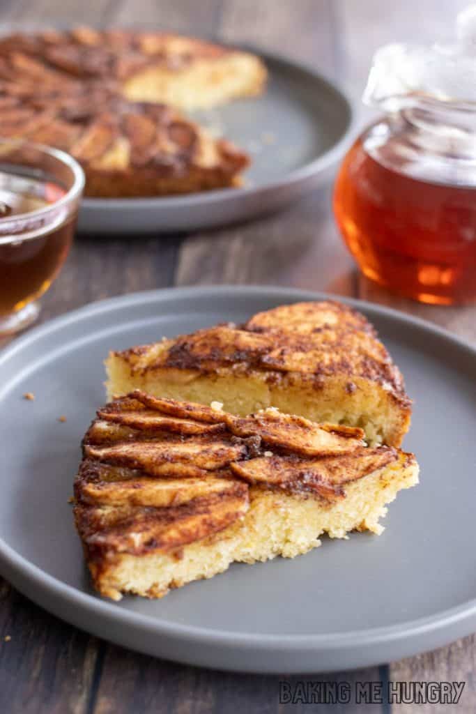 apple tea cake recipe sliced and served on plate with remaining cake behind