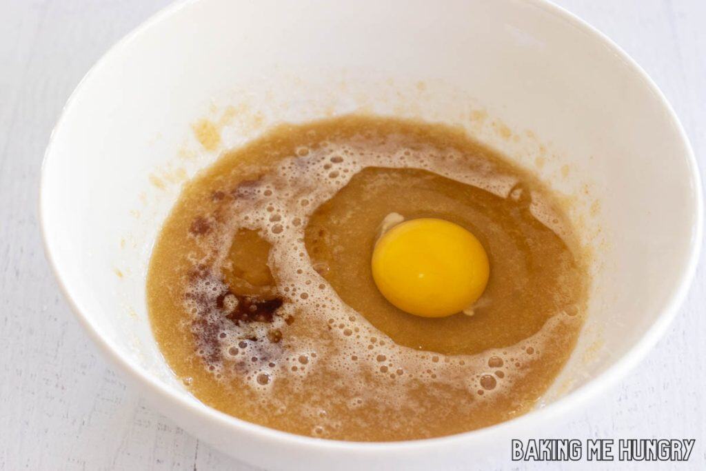 egg and vanilla added to bowl