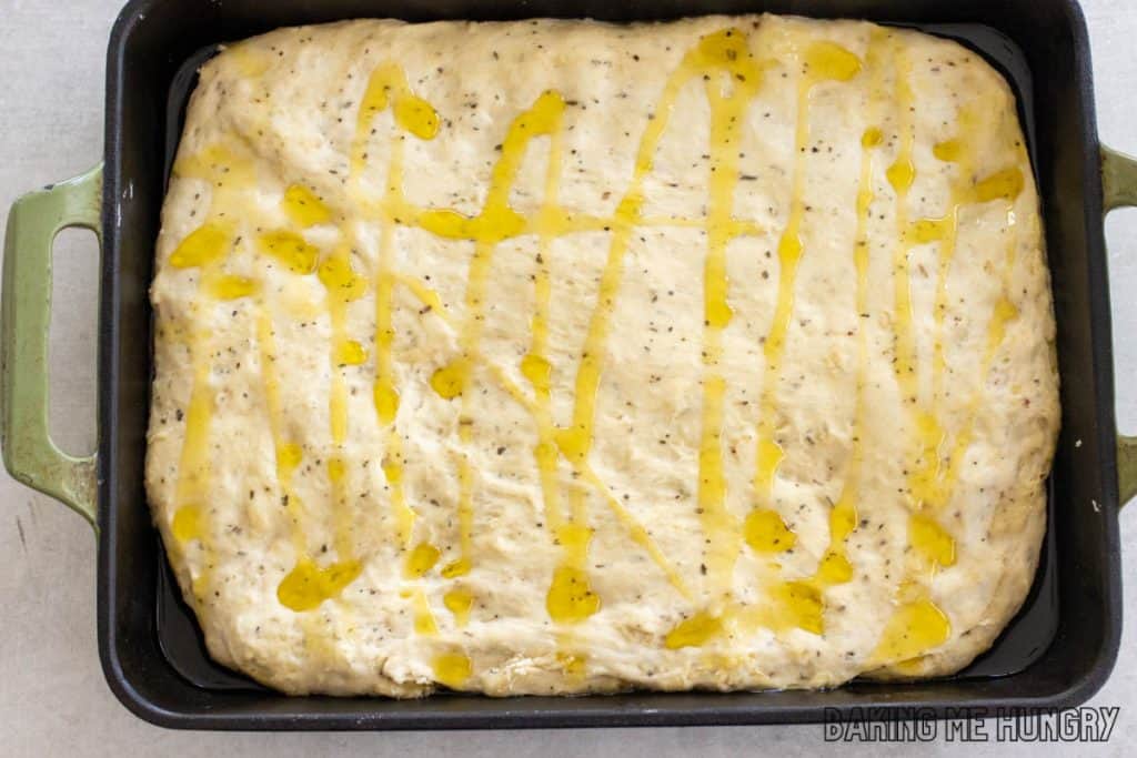 olive oil drizzled on the dough