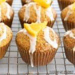 orange poppy seed muffins close up on wire rack