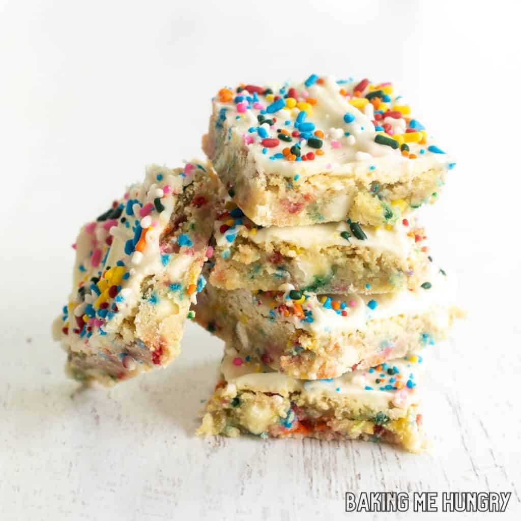 stack of birthday cake blondies with one on his side