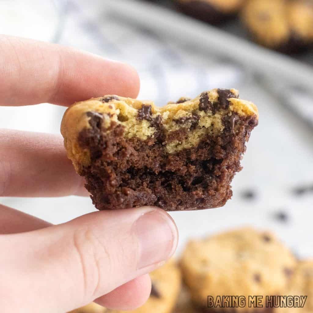 hand holding one of the cookies from the brookie bites recipe missing a bite