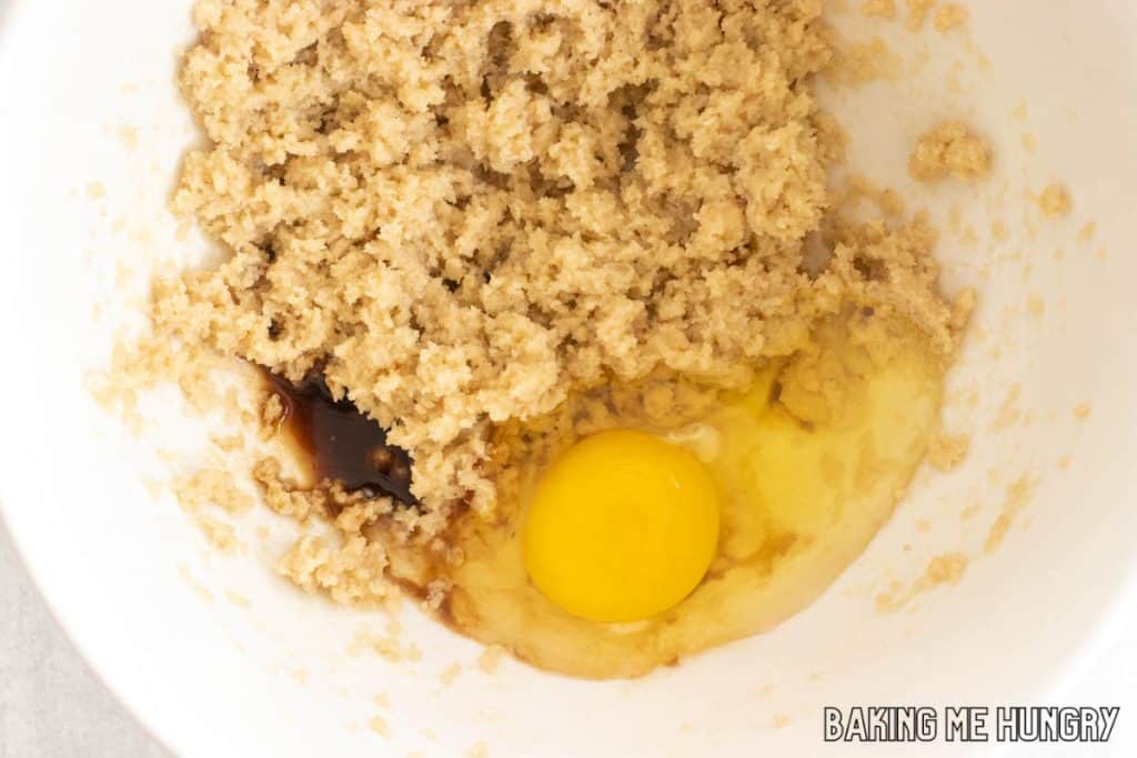 egg and vanilla added to bowl