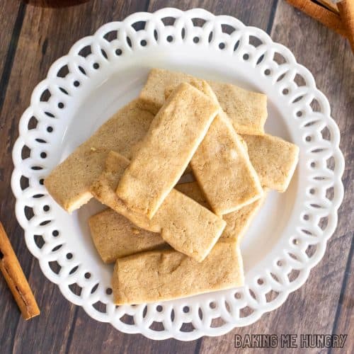 cinnamon shortbread cookies recipe piled on small decorative plate close up