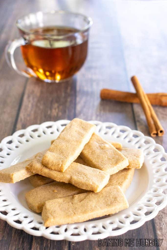 cinnamon shortbread cookies recipe on small decorative plate with tea behind