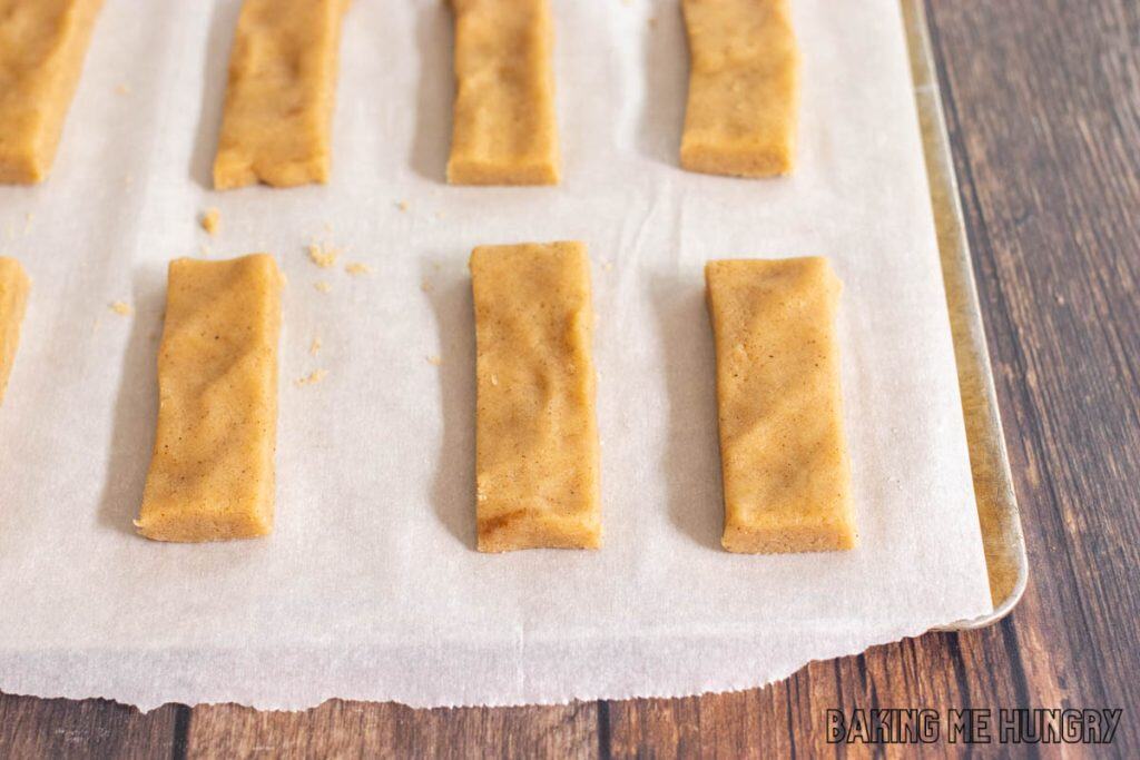dough cut into rectangles on parchment