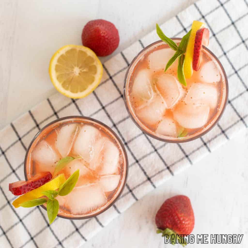 overhead shot of two glasses with strawberry basil lemonade