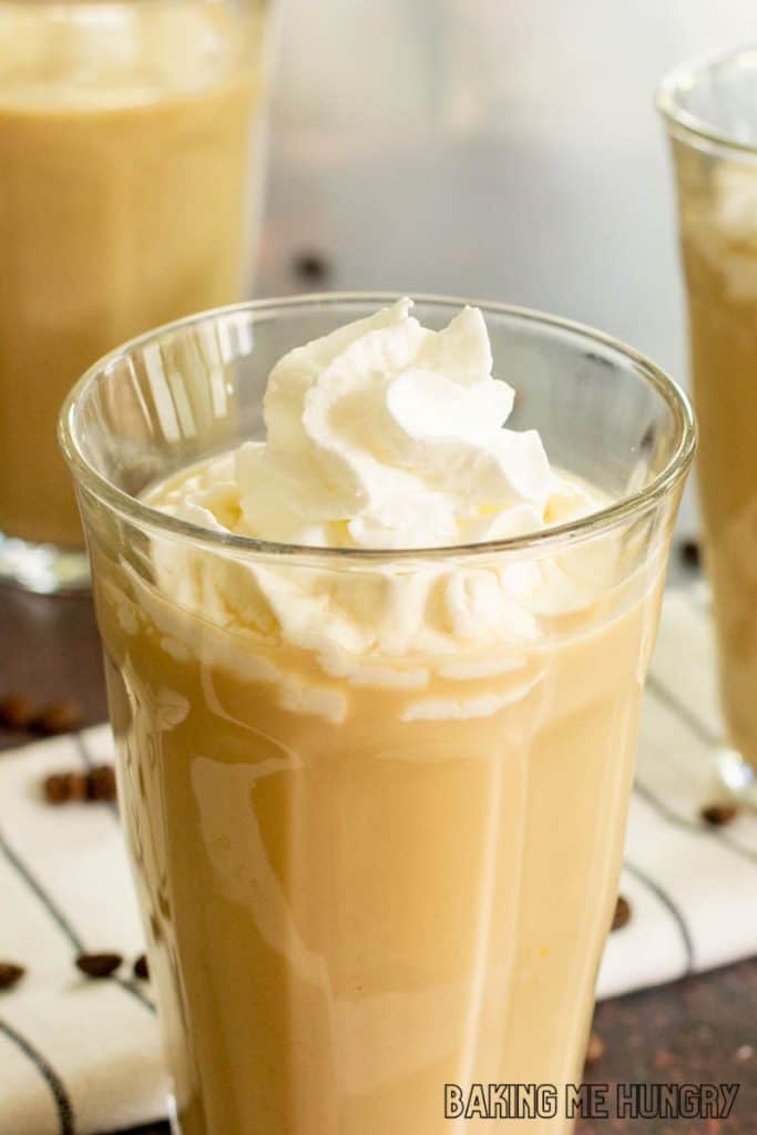 sweet iced coffee recipe in three tall glasses with whipped cream