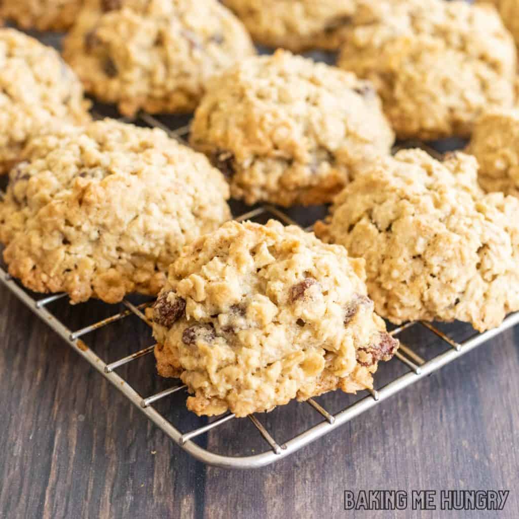 close up of apple oatmeal raisin cookies on wire rack