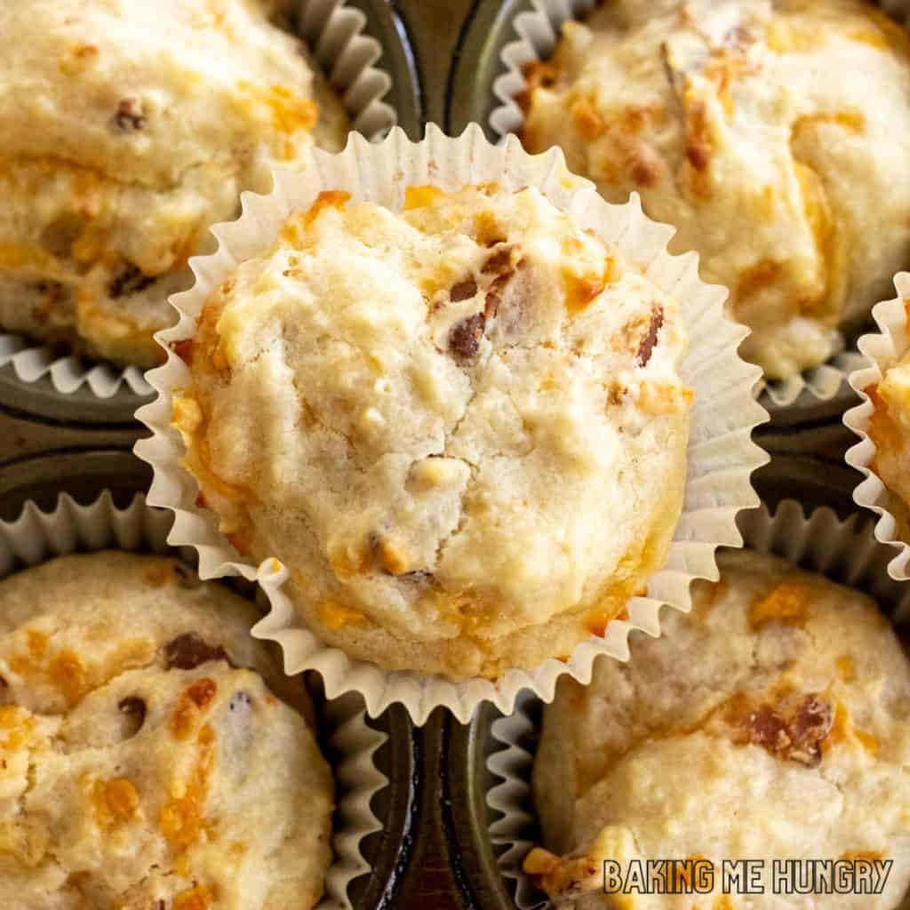 cheese and bacon muffins from overhead on muffin tin close up