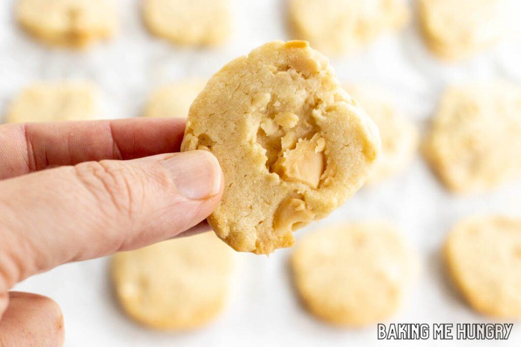hand holding one of the macadamia shortbread cookies