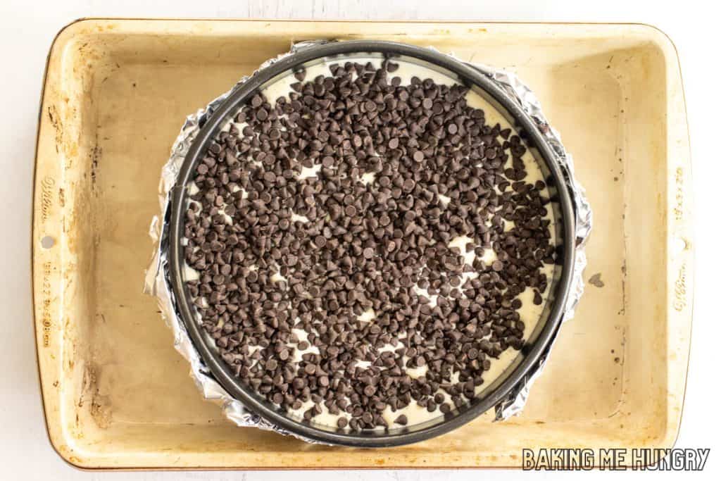 pan wrapped in foil in water bath