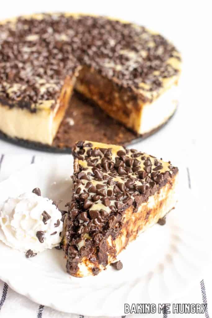 slice from the chocolate chip cheesecake recipe served on small plate in front of platter