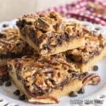 chocolate pecan pie bars on a small plate
