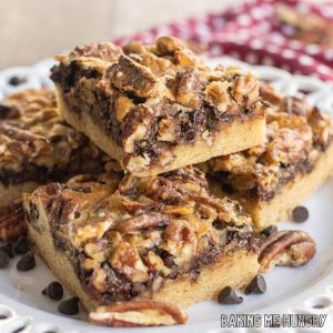 chocolate pecan pie bars on a small plate