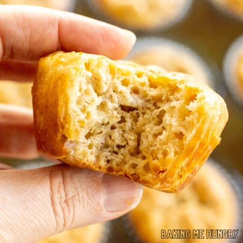 hand holding one of the banana cottage cheese muffins missing a bite