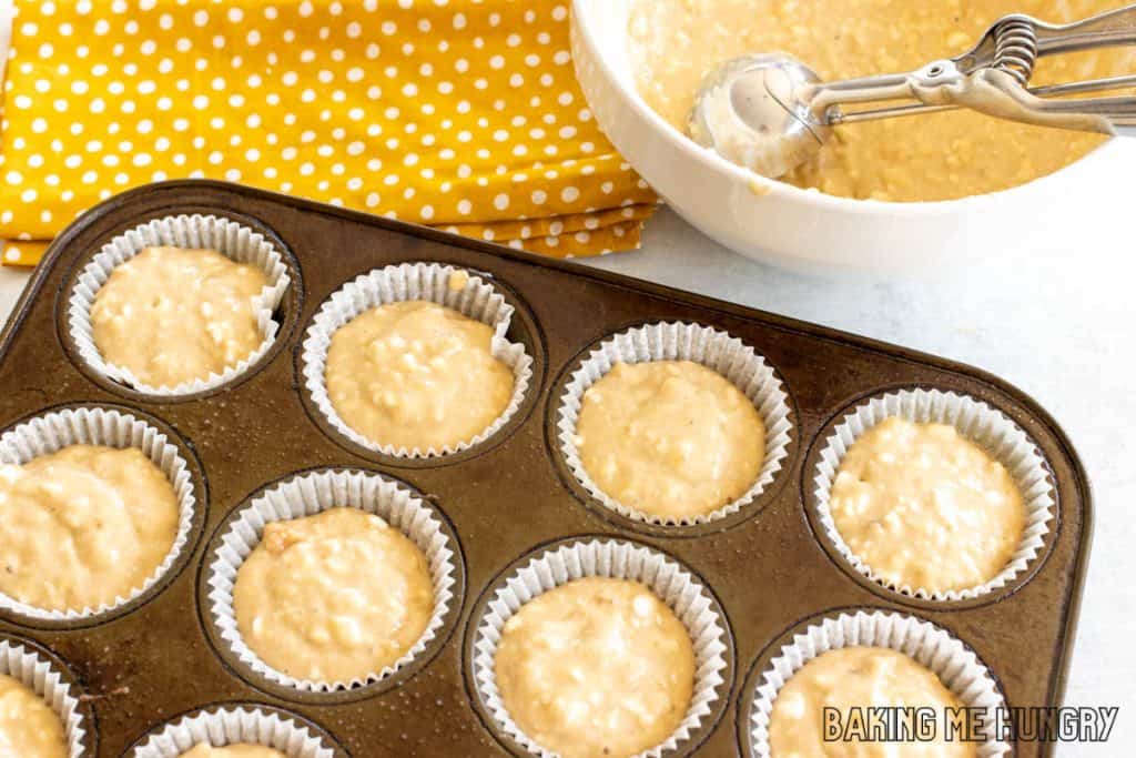 overhead shot of paper liners being filled with batter