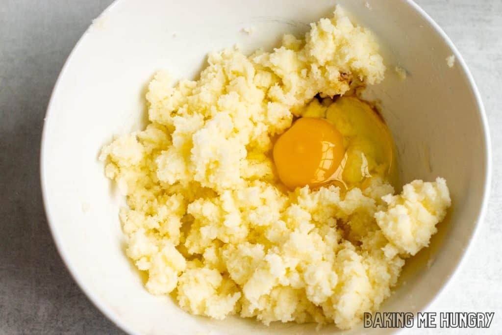 creamed butter and sugar with egg on top