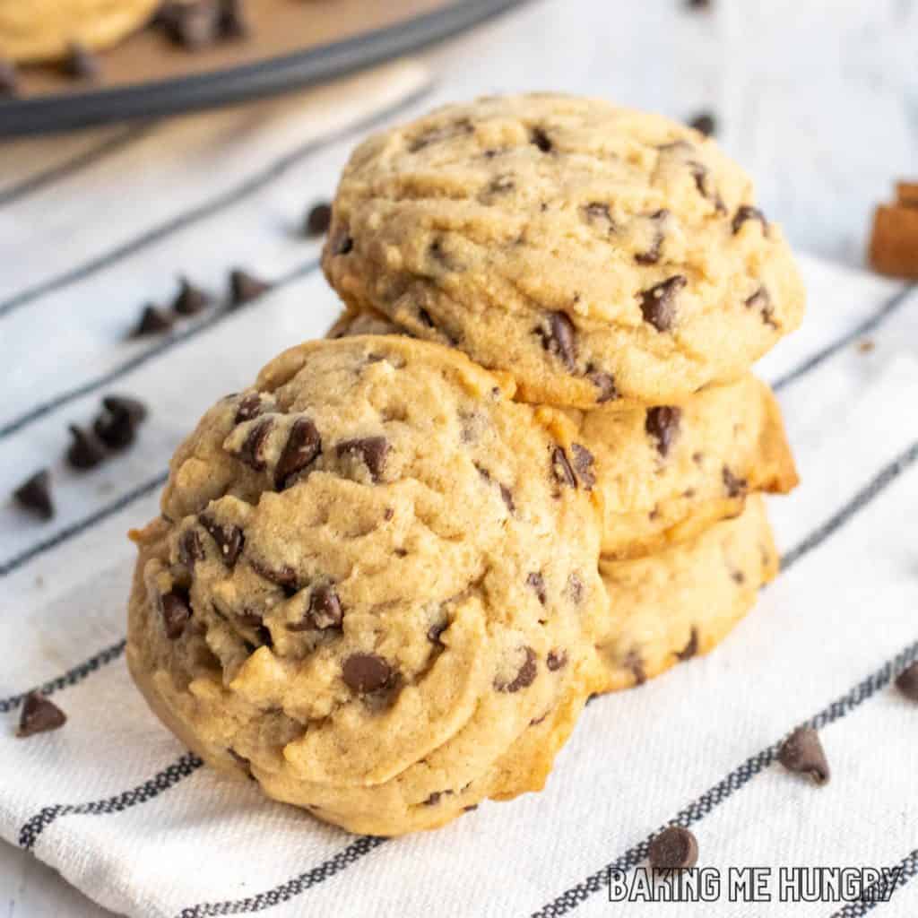 chocolate chip cinnamon cookies stacked with one leaning