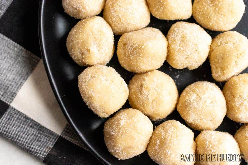 balls of edible sugar cookie dough on plate