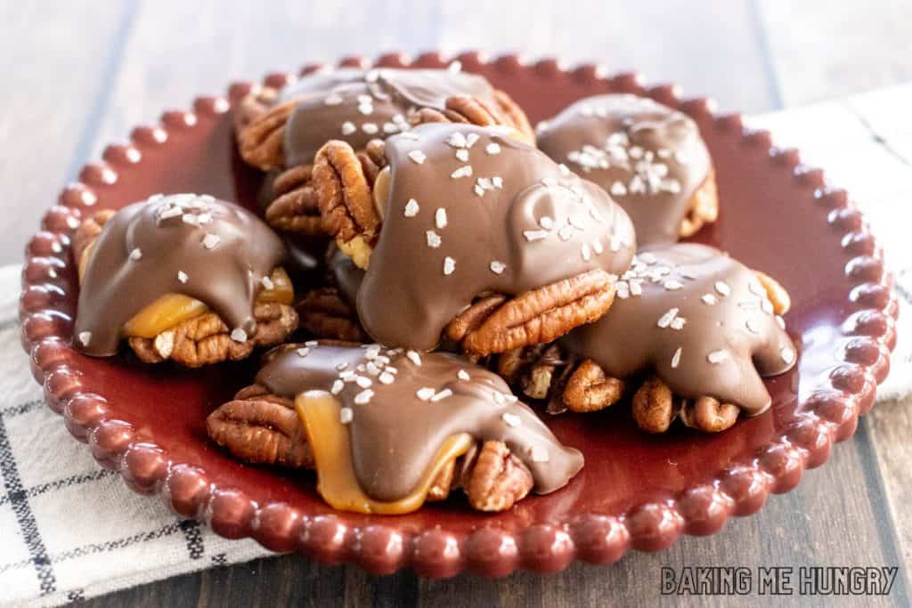 pecan caramel candies recipe on a maroon plate