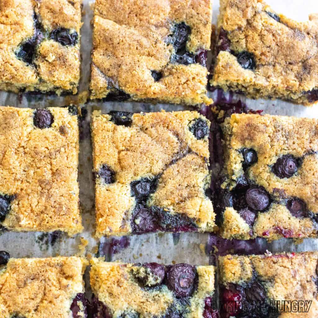 blueberry blondies recipe cut into bars on cutting board