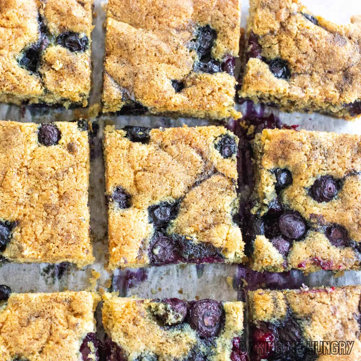 blueberry blondies recipe cut into bars on cutting board