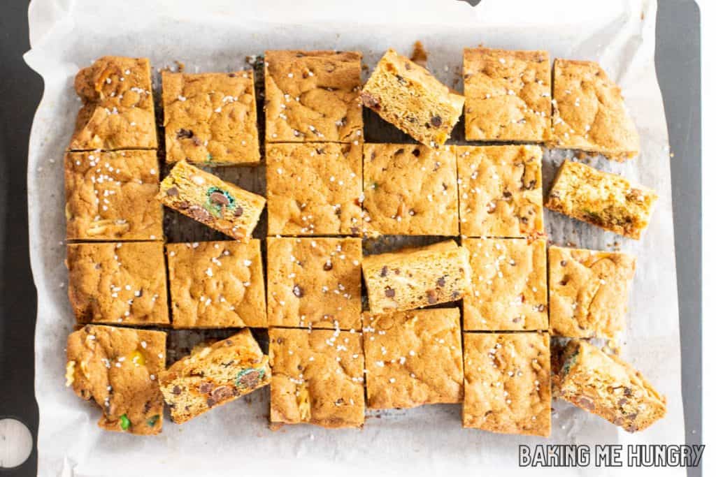cookie bars cut into squares on cutting board