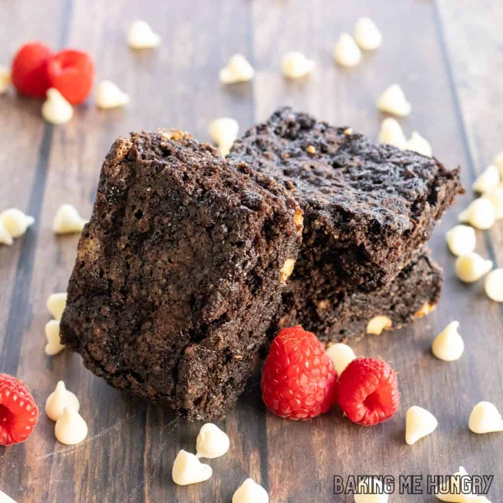 white chocolate raspberry brownies recipe in a stack with one on its side