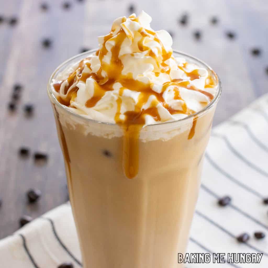caramel iced coffee recipe topped with whipped cream and caramel syrup close up in glass